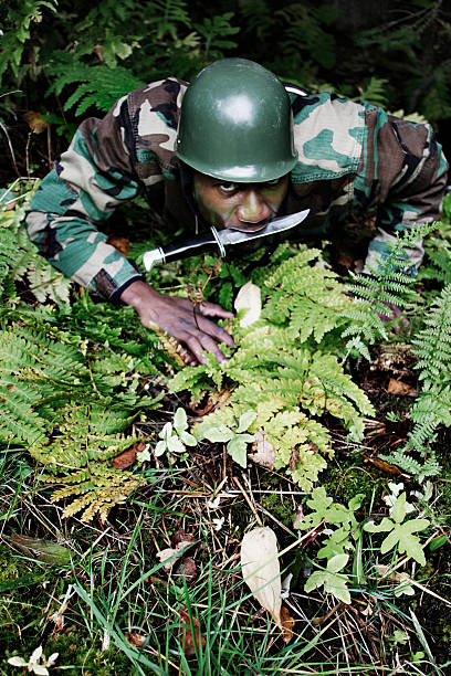 istock Camoflauged Army Soldier 471279703