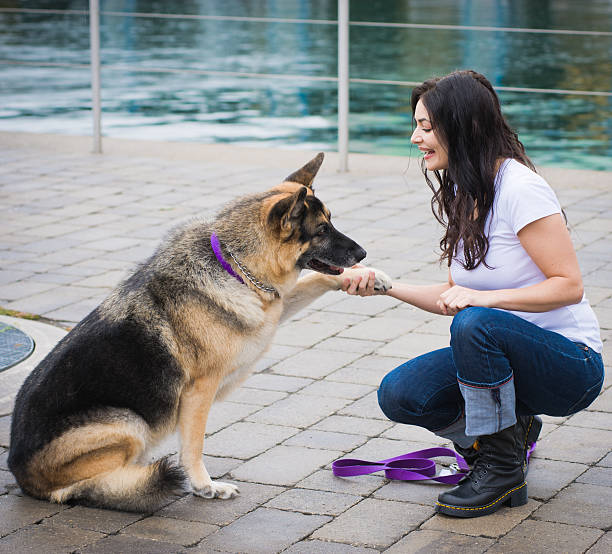 istock Woman with her Dog 471281355