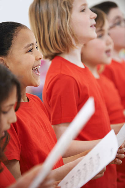 istock Group Of Children Singing In Choir Together 471282918