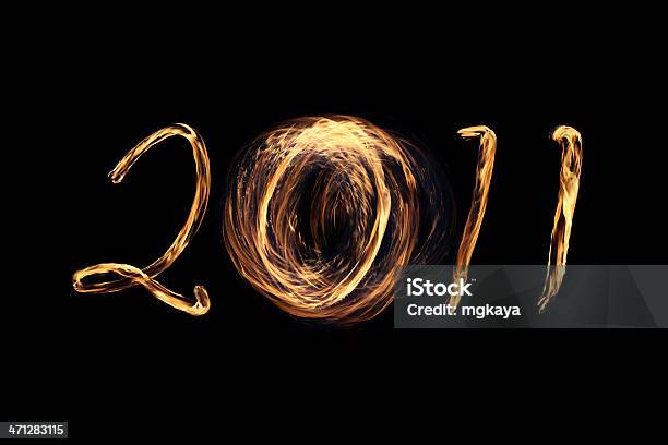 Fire Writing 2011 Stock Photo - Download Image Now - 2011, Black Background, Black Color