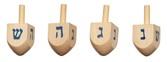 Four-sided spinning top, played with during the Jewish holiday of Hanukkah. Each side of the dreidel bears a letter of the Hebrew alphabet Nun, Gimel, Hei, Shin acronym for Nes Gadol Hayah Sham – 