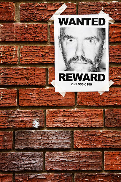 istock Single Wanted poster of desperate looking man on brick wall 471283785