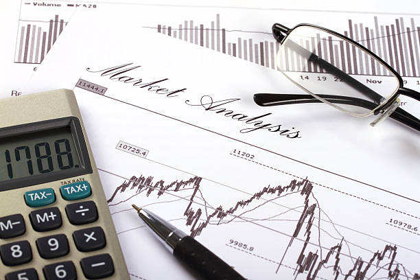 istock Stock market chart with pen and calculator 471285069