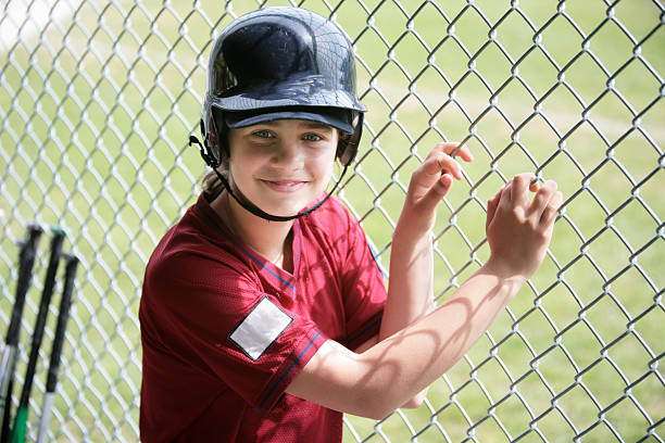 istock Youth League Player in Dugout 471286079