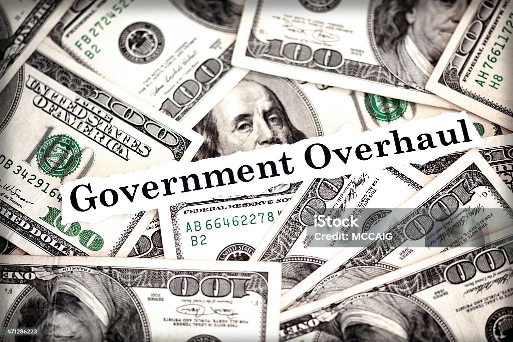 Government Overhaul The words "Government Overhaul" with hundred dollar bills in background. Business Stock Photo