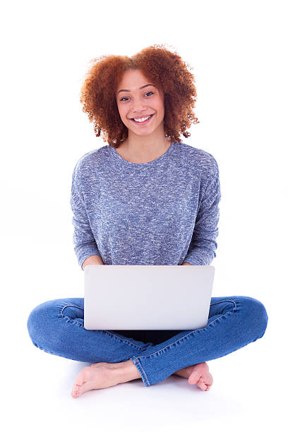 istock Black African American student girl using a laptop 471287242