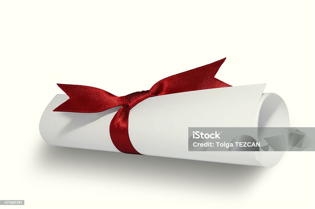 Diploma Diploma with red ribbon on white background. Award Stock Photo