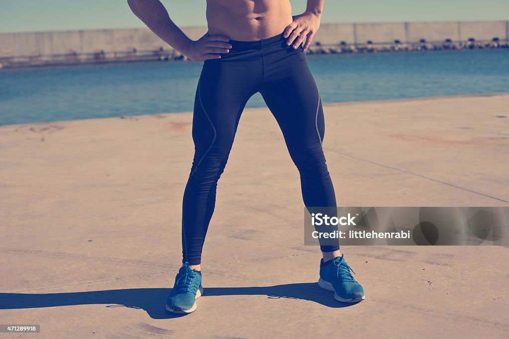 Athlete resting Athlete resting and standing with hands on waist (intentional vintage color) 2015 Stock Photo