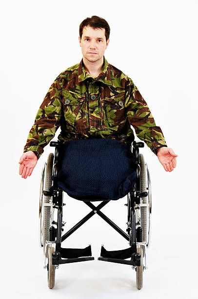 istock Upset Amputee Soldier In Wheelchair 471289987