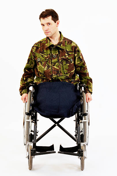 istock Wounded Soldier In Wheelchair 471290227