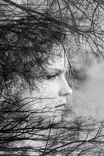istock creative portrait of young woman made from double exposure effect 471292138