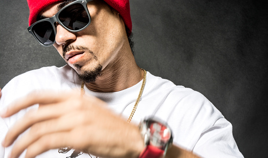 Black Hip Hop Rapper In Red Cap And Sunglasses Blur