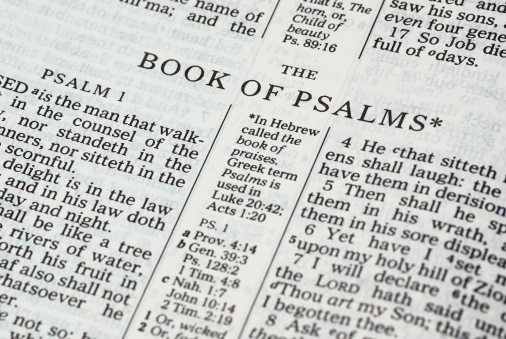Detail of the  Bible opened on Psalms.