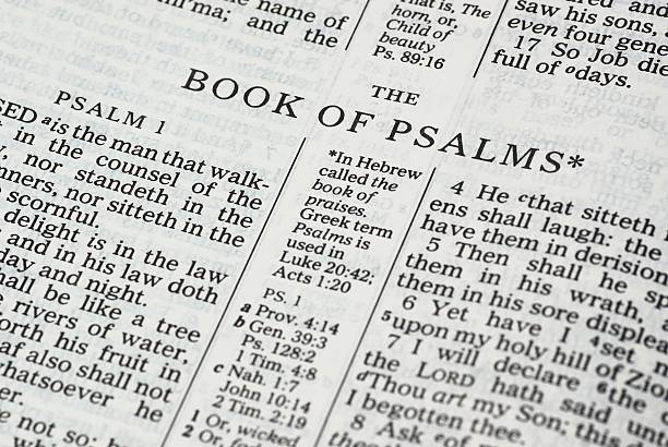 Book of Psalms Detail of the  Bible opened on Psalms. psalms stock pictures, royalty-free photos & images