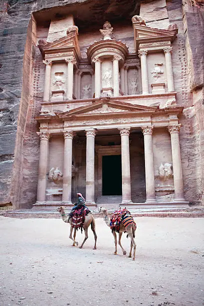 Photo of Bedouin with his camel at The Treasury,El Khazneh