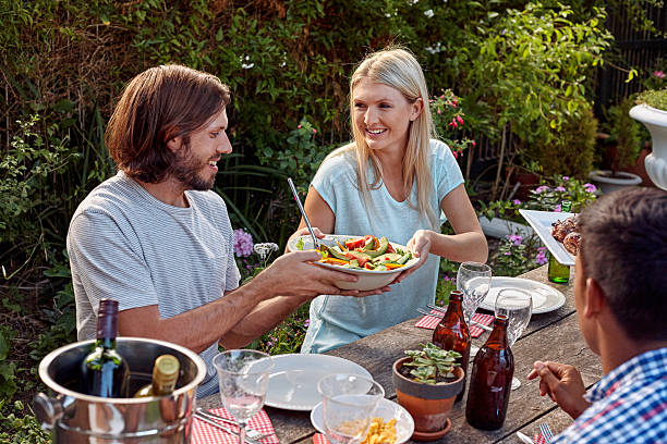 istock friends enjoying garden party 471295928