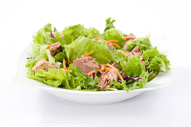 istock Salad with tuna in a white bowl 471296477