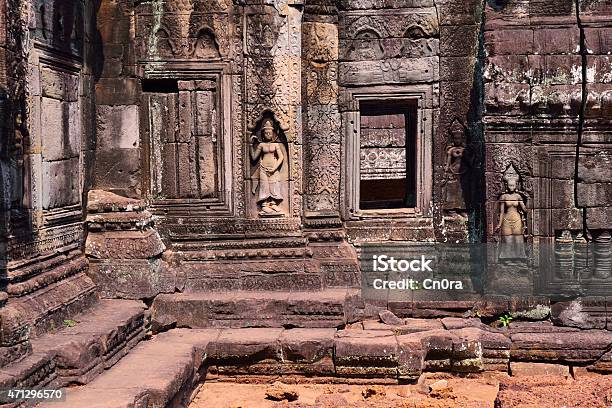 Apsara And Bas Relief By The Window In Angkor Wat Stock Photo - Download Image Now - 2015, Ancient, Ancient Civilization