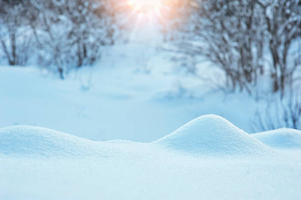 istock Winter background with a snowdrift and sun 471296762