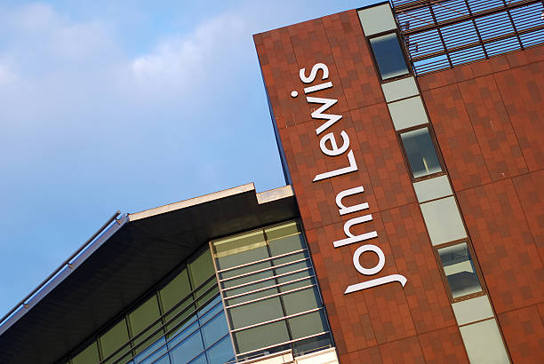 Sign of John Lewis store in Liverpool Liverpool, England - February 27, 2011: The sign of John Lewis store in Liverpool. John Lewis is chain of upmarket department stores operating throughout Great Britain. liverpool one stock pictures, royalty-free photos & images