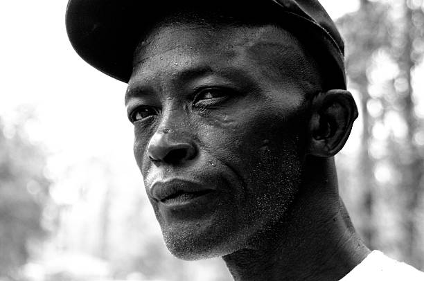 Pearlington, MS, USA - October 1, 2005:  Following Hurricane Katrina, a Pearlington, MS resident looks contemplative while sharing his story of the storm.  During the storm, this man helped one of his elderly neighbors to safety by pulling him from his porch onto his roof while the Hurricane waters rose.