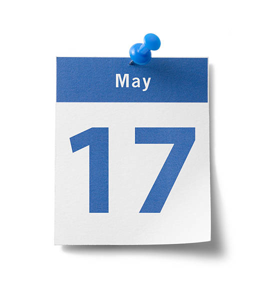 May 17th Calendar A photograph of a calendar page with a blue band and the date - "May 17th" - isolated on white. number 17 stock pictures, royalty-free photos & images
