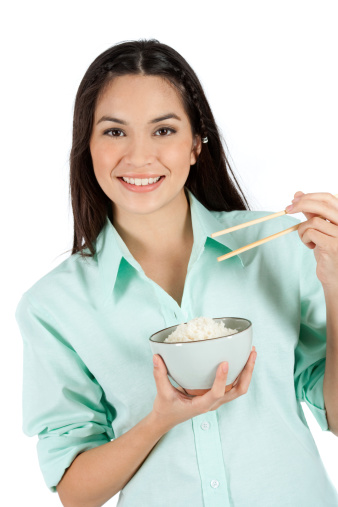 A Beautiful Young Woman Enjoying A Bowl White Rice. Please Click On The Image Below And Visit A LightBox With 140 Shots Of This Model From The 