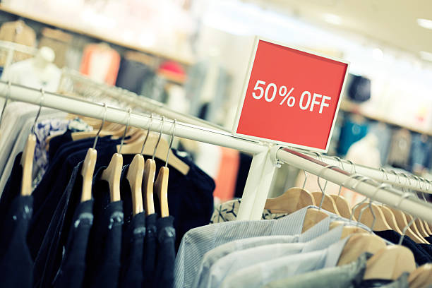 Retail Shopping Sale - Clothing in Fashion Store stock photo
