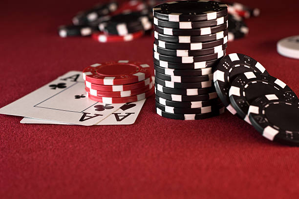 istock Aces, Casino Chips, Red Poker Table 471304129