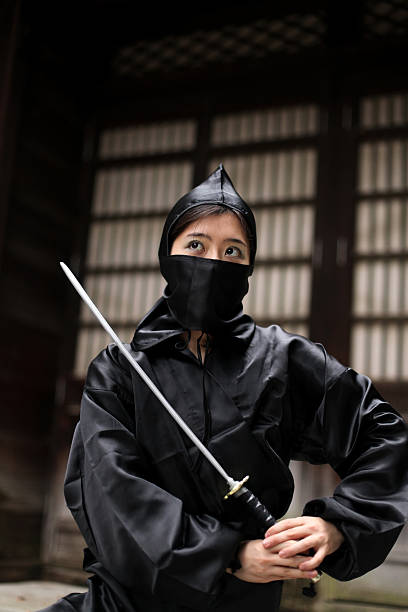 istock Asian woman showing her ninja moves 471304567