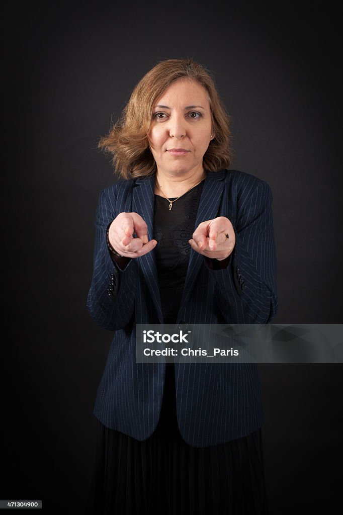 Beautiful woman doing different expressions in different sets of clothes Beautiful woman doing different expressions in different sets of clothes: gun sign 2015 Stock Photo