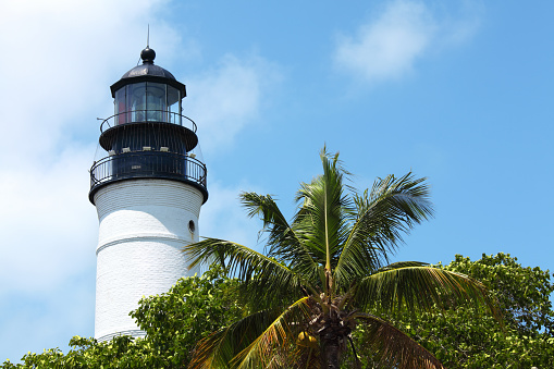 close up shot of lighthouse over clear sky in Key West, Florida.