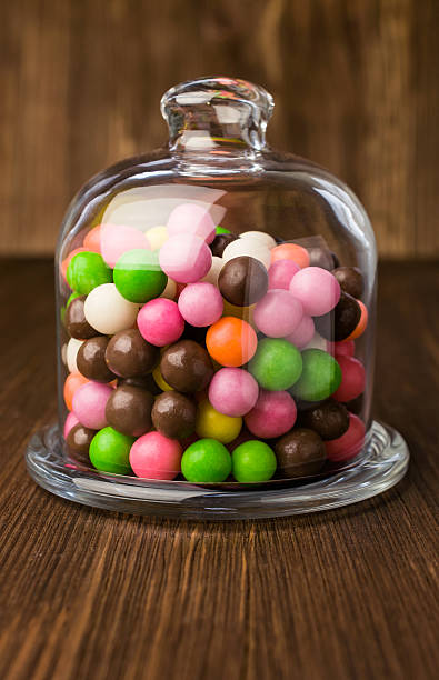 istock Colorful candies in a glass bell 471307948