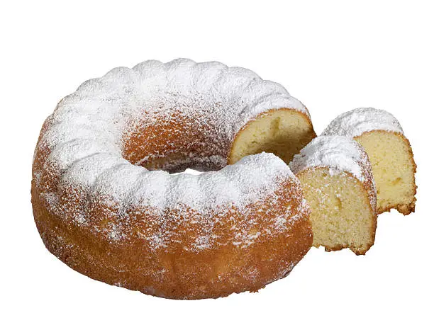 a brown cake named "Gugelhupf", overcast with powdered sugar in white back