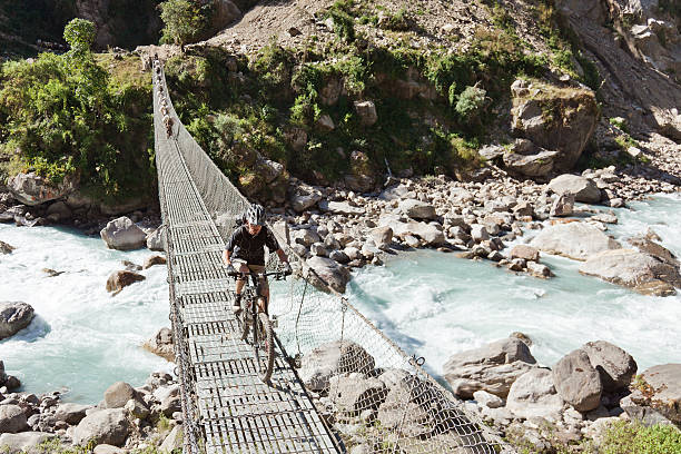 istock Traffic on suspension bridge, Nepal 471309823
