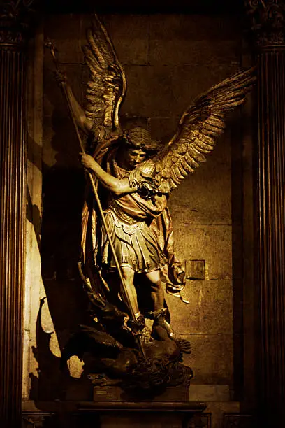 Statue of St. Michael slaying the dragon, Metropolitan Cathedral of Santiago. The statues and cathedral were constructed in the mid 1700s. Paper texture overlaid.