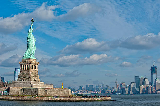 istock Statue Of Liberty in the deep blue sky 471310946
