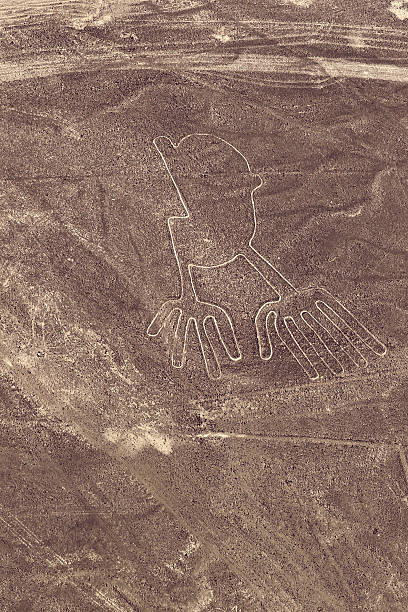 nazca-linien-hände - prehistoric antiquity stock-fotos und bilder