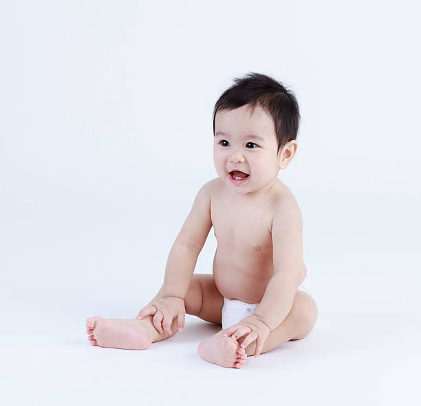 istock Thai baby sitting and laughing 471311296