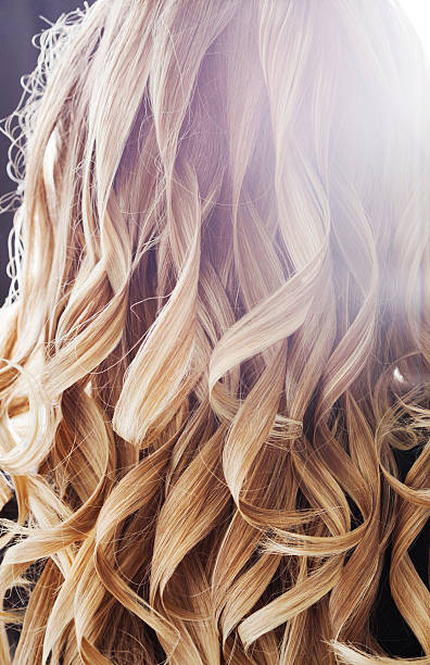 istock Freshly Curled Blonde Hair 471313673