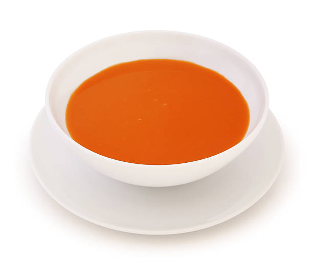 istock Tomato soup in a white bowl and dish on a white background 471314276