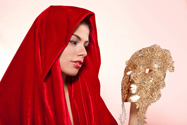 istock Beautiful woman with a mask 471314367
