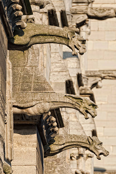 istock notre dame paris statues and gargoyles 471315464