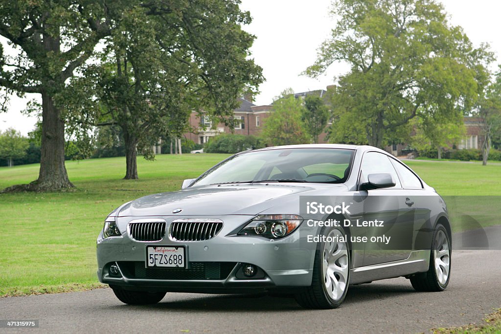 BMW 645i Nashville, Tennessee, USA - September 27th, 2004: A silver 2004 BMW 645i with California license plates driving down a small driveway of a large house in Nashville TN on an overcast day. BMW Stock Photo