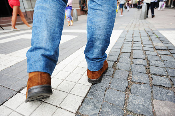 istock Pedestrian on tiled street 471317401