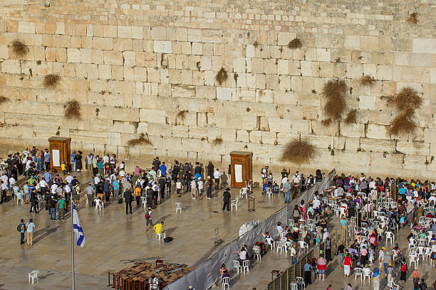istock Praying at the Wailing Wall in Jerusalem 471318096