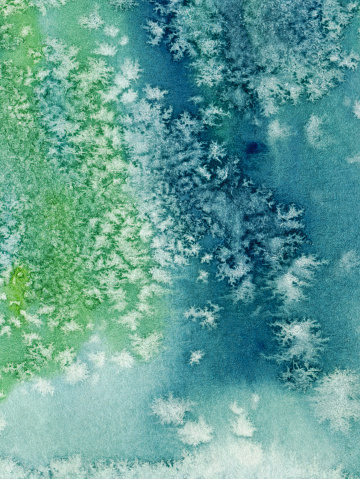 Hand painted abstract watercolor. Shades of green and blue are the prominent colors in this painting. there is a texture of paint movement and pooling, as well as a flakey texture that resembles snowflakes.