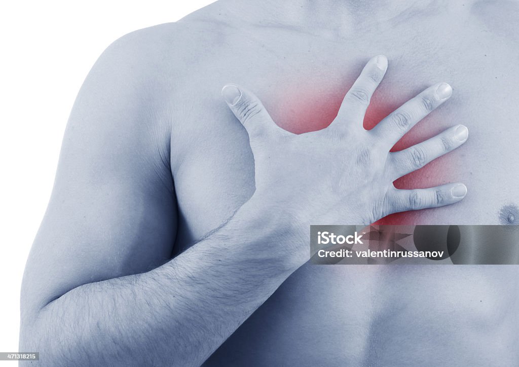 Pain Man  holding hand to spot chest pain  - SEE MORE IMAGES IN MY "PAIN SERIES' LIGHTBOX Adult Stock Photo