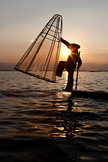 istock Fisherman on Inle lake, Myanmar 471318409