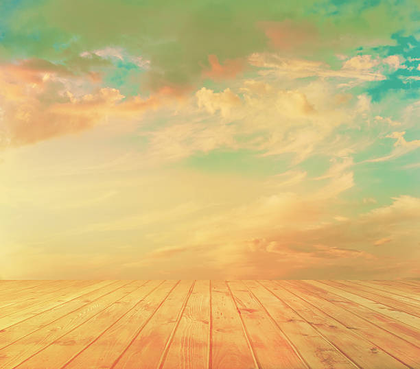 istock sunset sky and wood floor 471318594